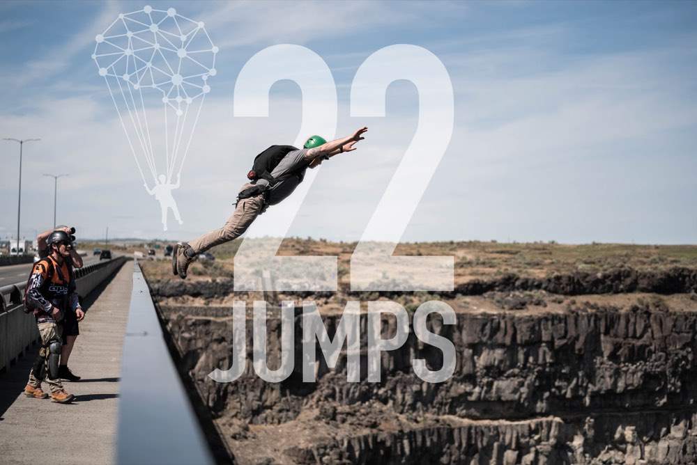 A jumper under the 22 Jumps canopy at the Perrine Bridge